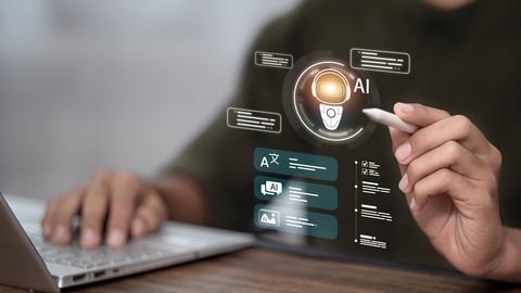 Person using laptop and stylus with AI interface